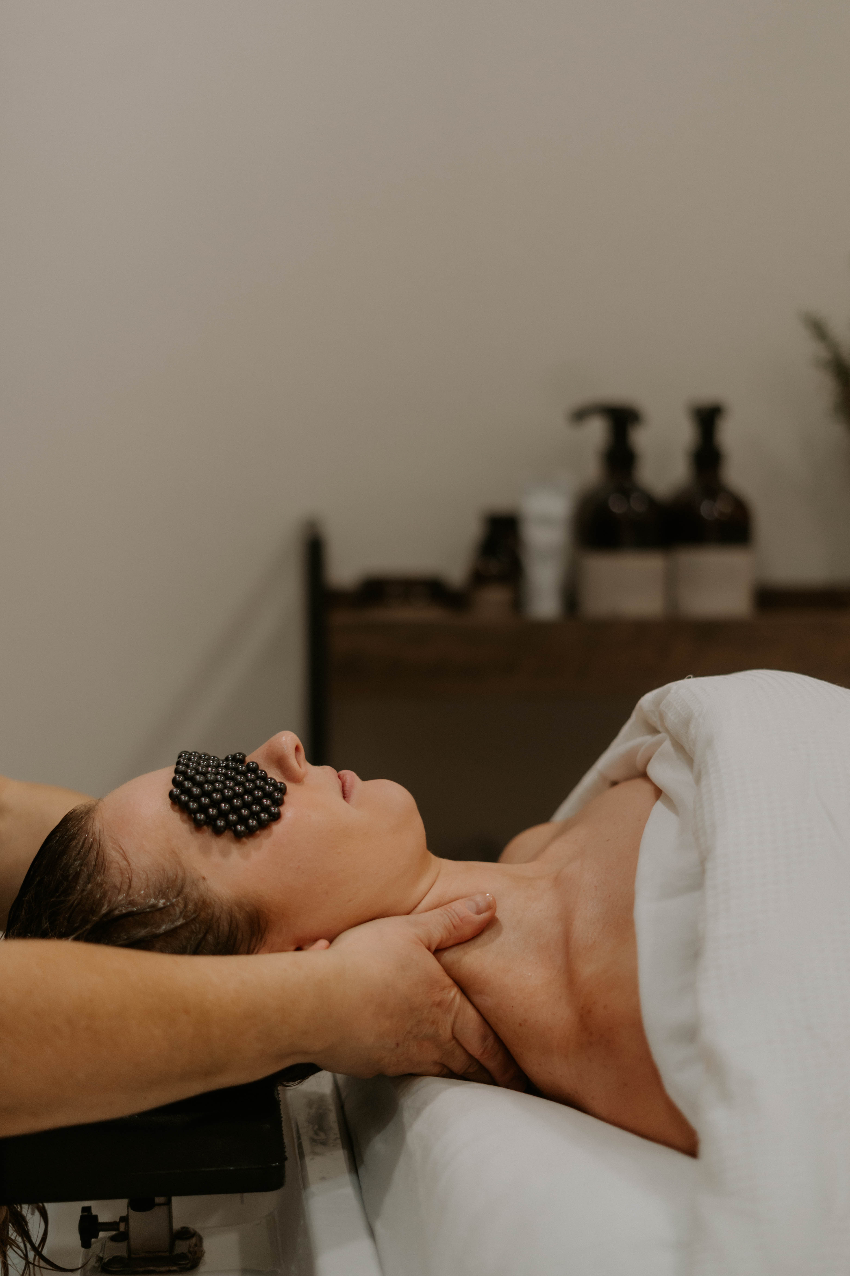 Cropped photo of the exterior of the top floor of an old stone building.