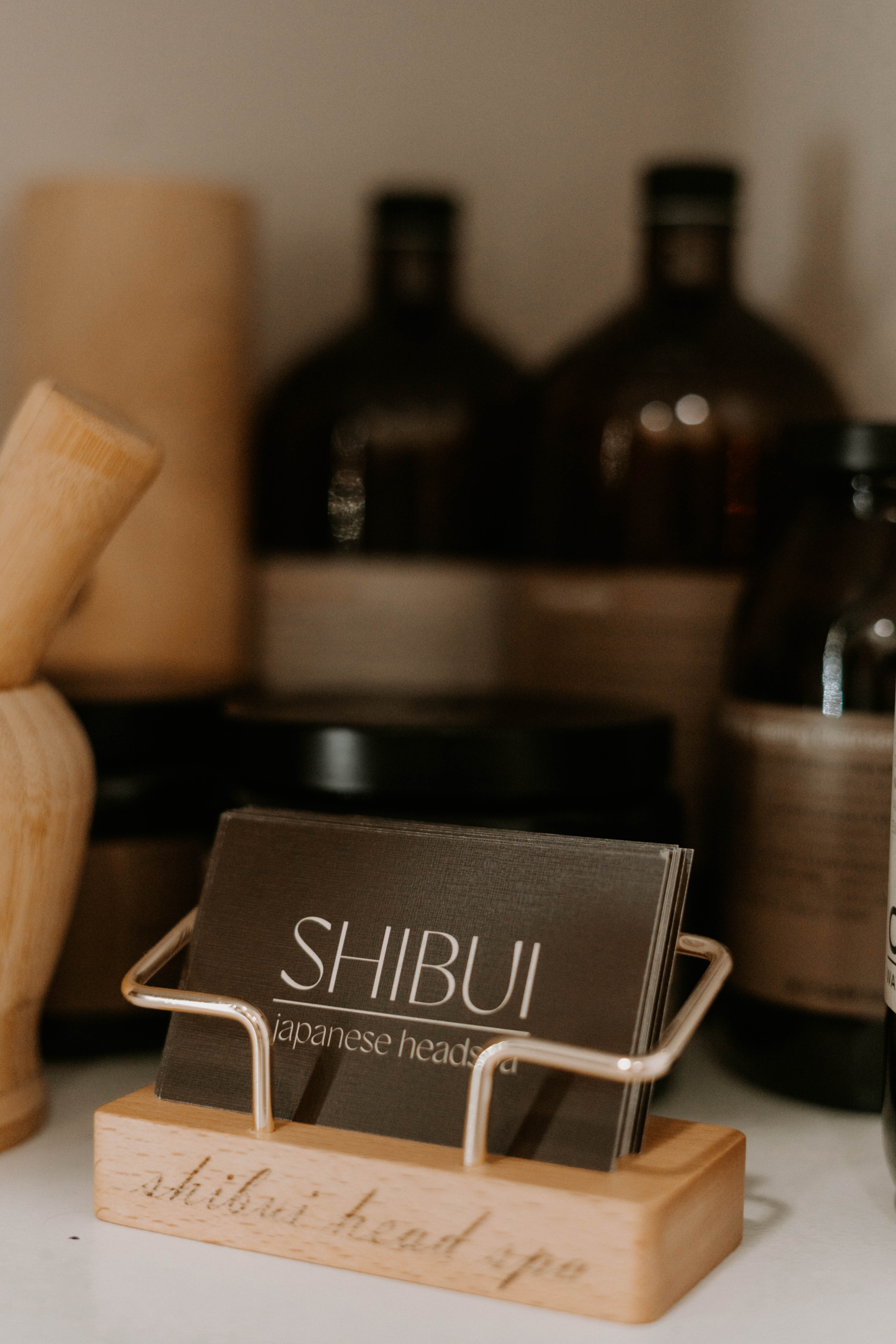 A dried flower rested upon wrinkled pieces of cloth paper.